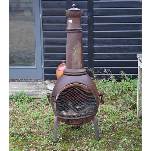 423 - A cast iron patio heater/chimenea, 140 cm high