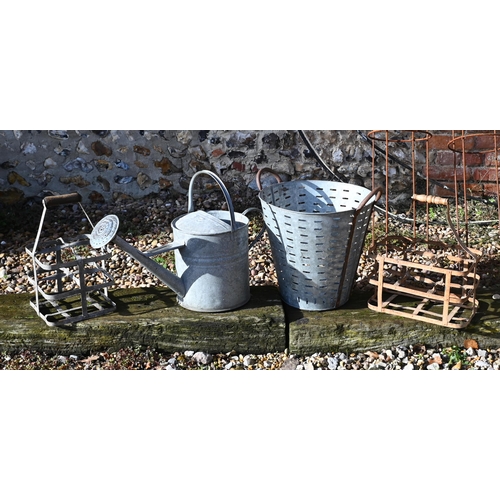 424 - A galvanised garden bath planter 84 cm wide to/w pair of bucket planters, watering can, two oyster b... 