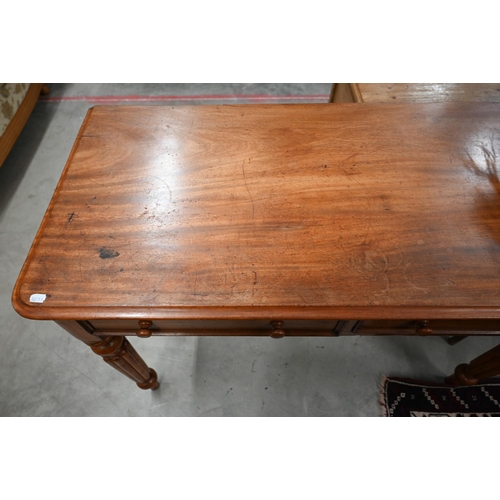 43 - Victorian mahogany two drawer hall table on turned and reeded supports, drawer bears 'Druce & Co... 