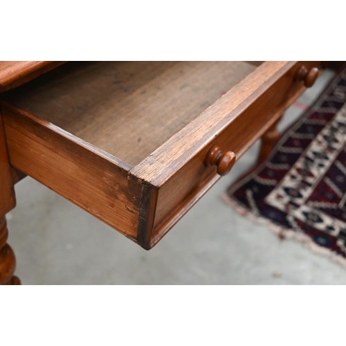 43 - Victorian mahogany two drawer hall table on turned and reeded supports, drawer bears 'Druce & Co... 