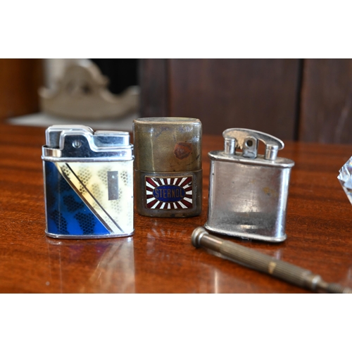 430 - Four assorted cigarette lighters (4)