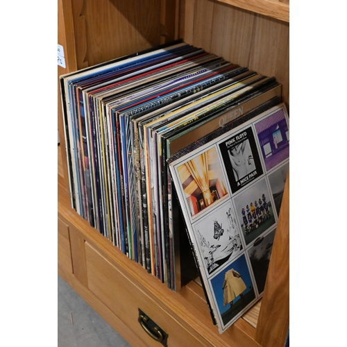 440 - A large collection of 33 rpm LP vinyl records - mostly rock and pop 1970s/early 1980s