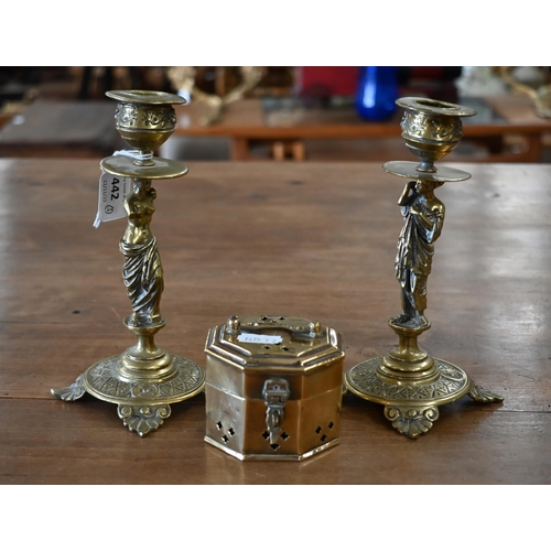 442 - A pair of Victorian brass candlesticks, the columns cast with classical female figures to/w a betel-... 