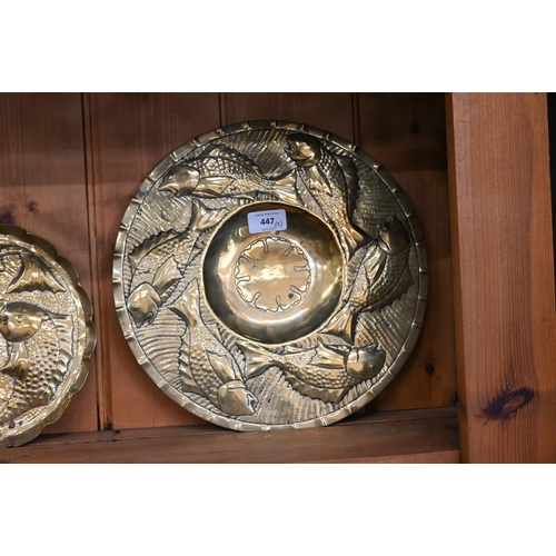 447 - Two Arts & Crafts brass trays embossed with fish in the Newlyn manner (unmarked) 32/23 cm