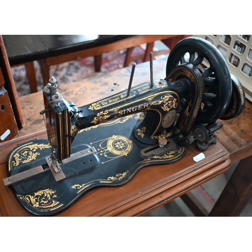 460 - # An antique Singer sewing machine with case