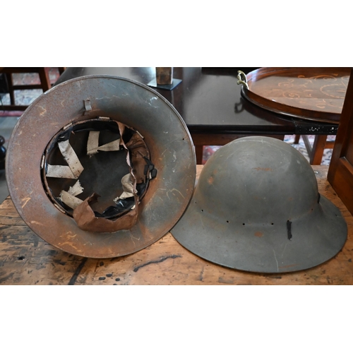 461 - Two World War II British Civil Defence Kuckermann steel helmets - one stencilled 'SFP' (2)