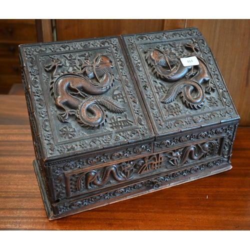 464 - An antique Chinese carved wood stationery box decorated with dragons, bats, florettes etc the lower ... 