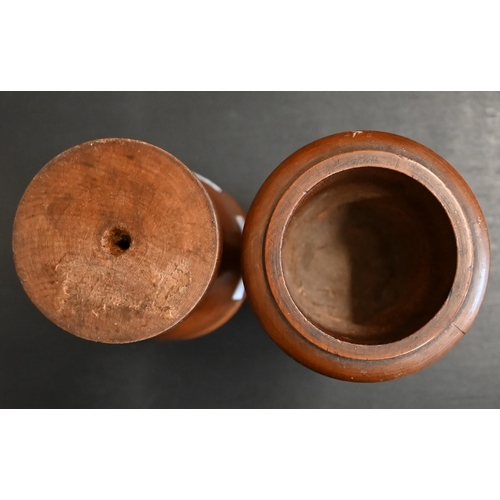 465 - A small pair of turned fruitwood urns, 13.5 cm (2)