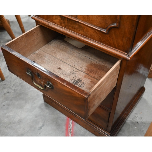 47 - A 19th century mahogany drinks cabinet with panelled door over three drawers, 52 cm wide x 45 cm dee... 