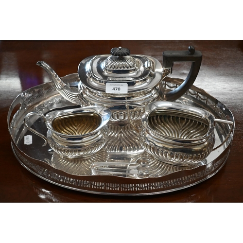 470 - An epns half-reeded three-piece tea service, to/w an oval tray with pierced gallery (4)