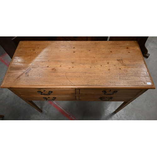 48 - An antique four drawer hall table on tapering square supports, 92 cm x 40 cm x 70 cm high