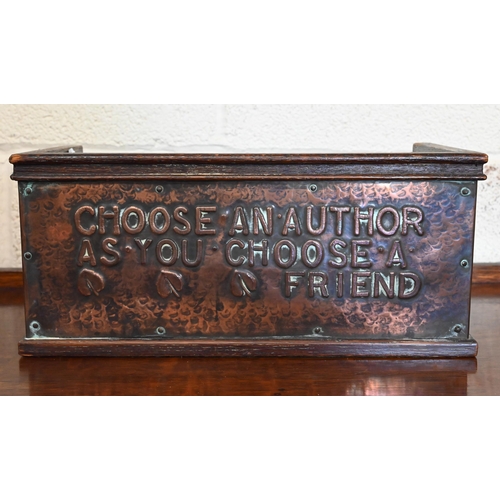 489 - An Arts & Crafts oak bookstand applied with an embossed copper sheet, inscribed 'Choose An Autho... 