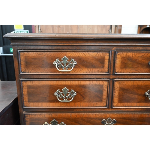 5 - A 'Drexel' reproduction mahogany tallboy chest, six long graduating drawers with brass handles on br... 