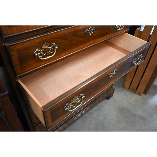 5 - A 'Drexel' reproduction mahogany tallboy chest, six long graduating drawers with brass handles on br... 
