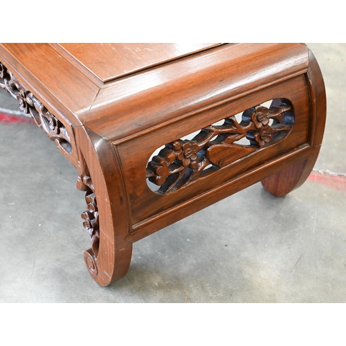 54 - A 20th century Chinese hardwood small coffee table with scroll legs and bird and prunus design carve... 