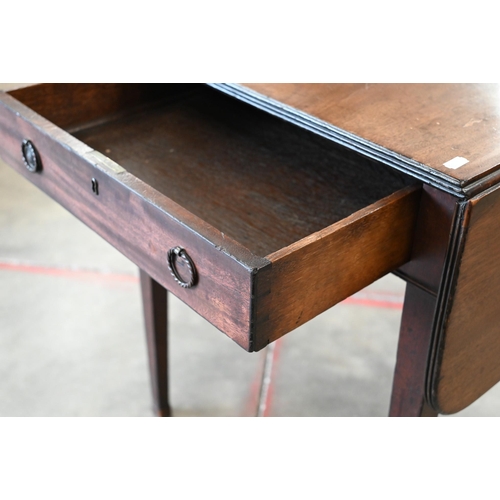 6 - A 19th century mahogany Pembroke table on tapering square supports