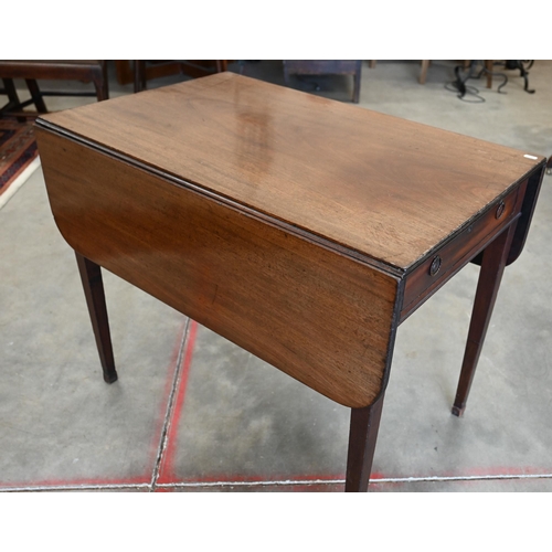 6 - A 19th century mahogany Pembroke table on tapering square supports