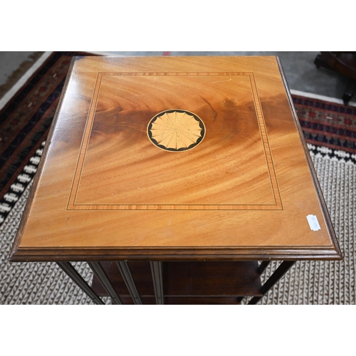 61 - A reproduction bleached mahogany inlaid revolving bookcase, 46 x 46 x 78 cm high