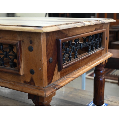 65 - An Indian 'Thakat' hardwood coffee table with metal trellis frieze and turned legs, 110 cm x 60 cm x... 