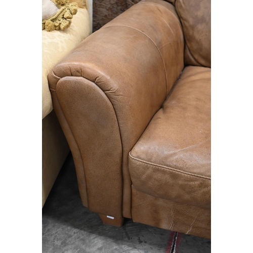 67 - A tan leather two seater sofa, 150 x 100 x 90 cm high