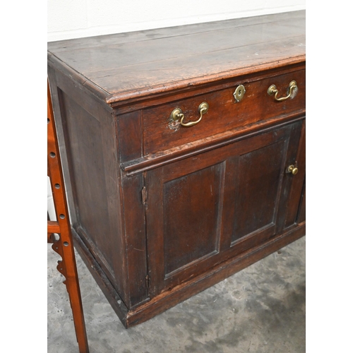 74 - An antique oak dresser base with two drawers over panelled cupboard doors, 172 x 58 x 90 cm high