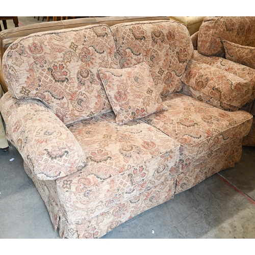 76 - # A Duresta scroll arm two seater sofa with old gold floral and foliate upholstery, 156 cm wide x 86... 