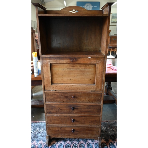 81 - A mahogany escritoire/secretary desk with fall front panel enclosing fitted interior over four drawe... 