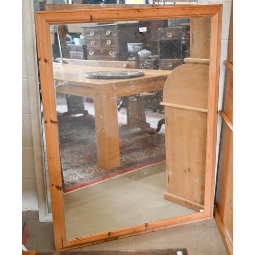 82 - A rectangular mirror in moulded pine frame, 136 x 104 cm