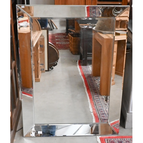 83 - A large contemporary bevelled wall mirror, 122 x 92 cm