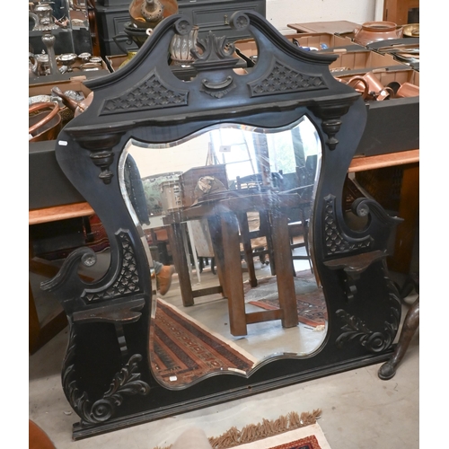 85 - A Victorian carved and ebonised overmantel mirror, 130 cm wide x 134 cm high