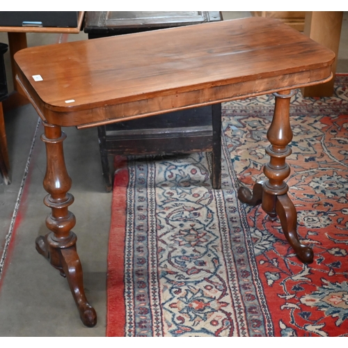 87 - A Victorian mahogany side table on turned supports with shaped legs, a/f