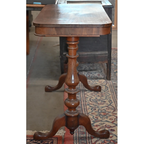 87 - A Victorian mahogany side table on turned supports with shaped legs, a/f