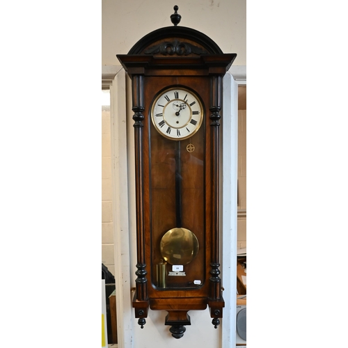 88 - Vienna style walnut and ebonised wall clock c/w pendulum and key a/f, 120 cm high