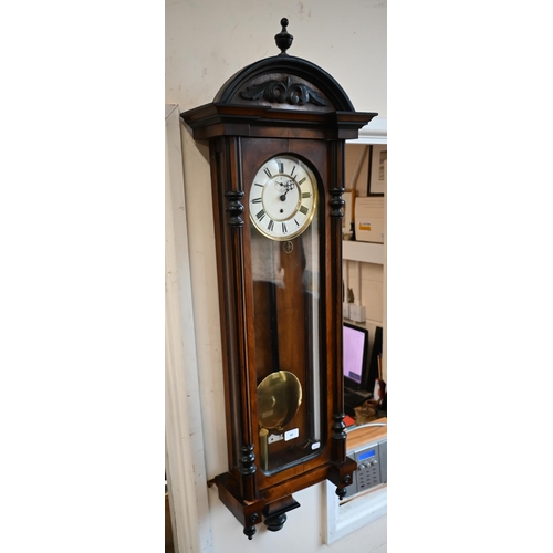 88 - Vienna style walnut and ebonised wall clock c/w pendulum and key a/f, 120 cm high