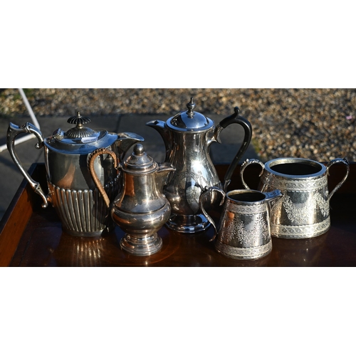 497 - A set of six electroplated coffee pots, two other coffee pots, two hot water jugs and a milk and sug... 