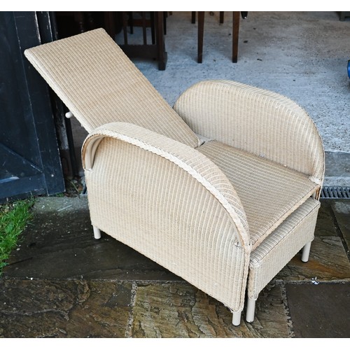 112 - A bamboo and wicker conservatory armchair, a wicker armchair with adjustable highback and pull-out s... 