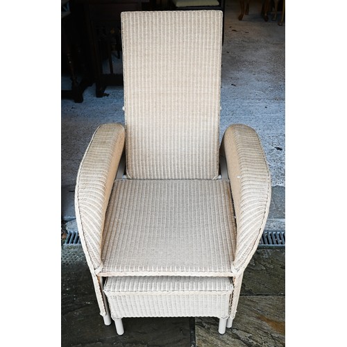 112 - A bamboo and wicker conservatory armchair, a wicker armchair with adjustable highback and pull-out s... 