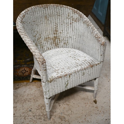 112 - A bamboo and wicker conservatory armchair, a wicker armchair with adjustable highback and pull-out s... 