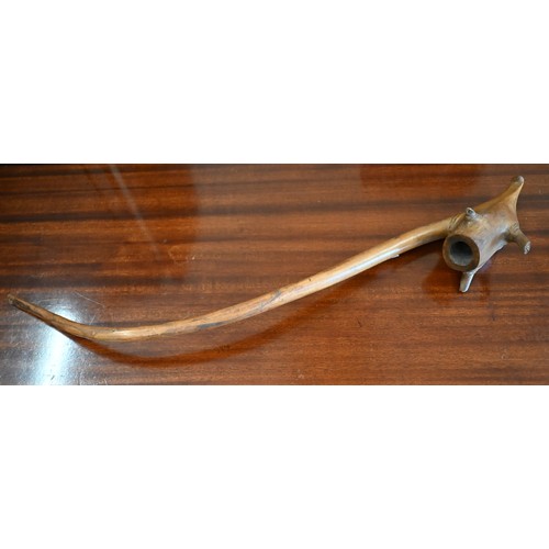 437 - An antique wooden large smoking pipe, 65 cm