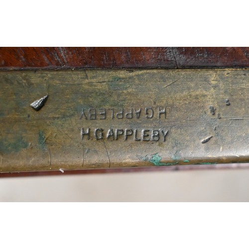 110 - A 19th century mahogany and brass mounted twin pedestal desk with gilt tooled green leather top over... 