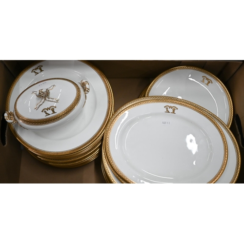 644 - A Victorian china part dinner service with gilt double crests and rims, by John Mortlock (London), c... 