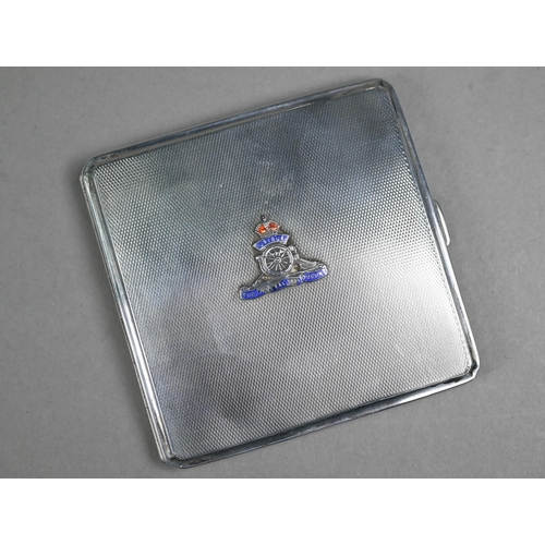 101 - An engine-turned silver cigarette case, mounted with enamelled Royal Artillery badge, Thomas William... 