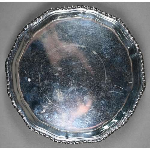 102 - A silver card salver with gadrooned rim and scroll feet, D & J Wellby Ltd, London 1924, 5.4oz, 1... 