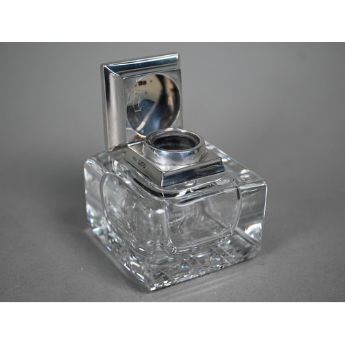 109 - An Edwardian cut and polished glass square inkwell with silver collar and cover, John Grinsell &... 