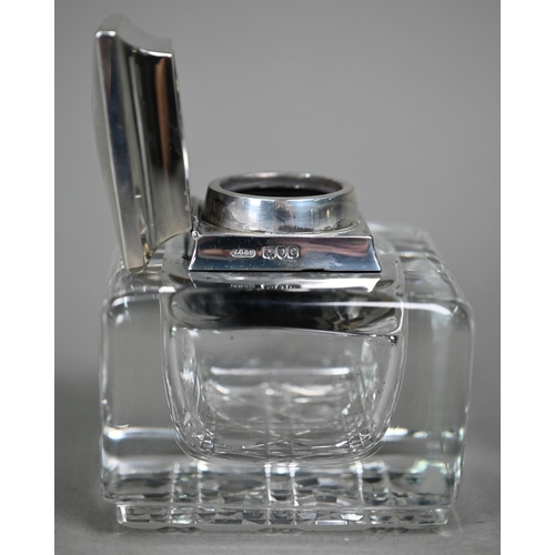 109 - An Edwardian cut and polished glass square inkwell with silver collar and cover, John Grinsell &... 