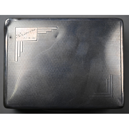 117 - A silver cigarette box with Art Deco style engine-turning, to/w a tubular cigar-case stamped '925' a... 