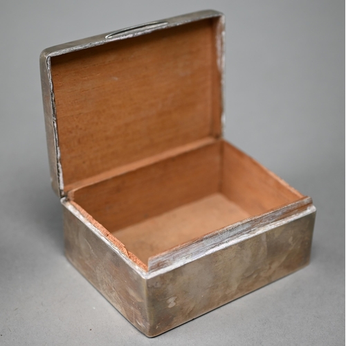 117 - A silver cigarette box with Art Deco style engine-turning, to/w a tubular cigar-case stamped '925' a... 