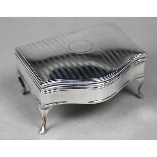 121 - A silver serpentine-front ring box with fitted blue velvet lining, on cabriole supports, Martin, Hal... 