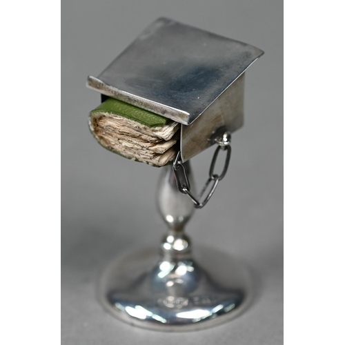 122 - A novelty silver miniature lectern, containing a miniature New Testament (book a/f), Henry Williamso... 