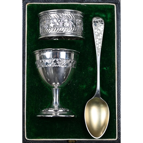 131 - Two cased silver egg cups with spoons - one also with napkin ring - to/w a cased miniature condiment... 